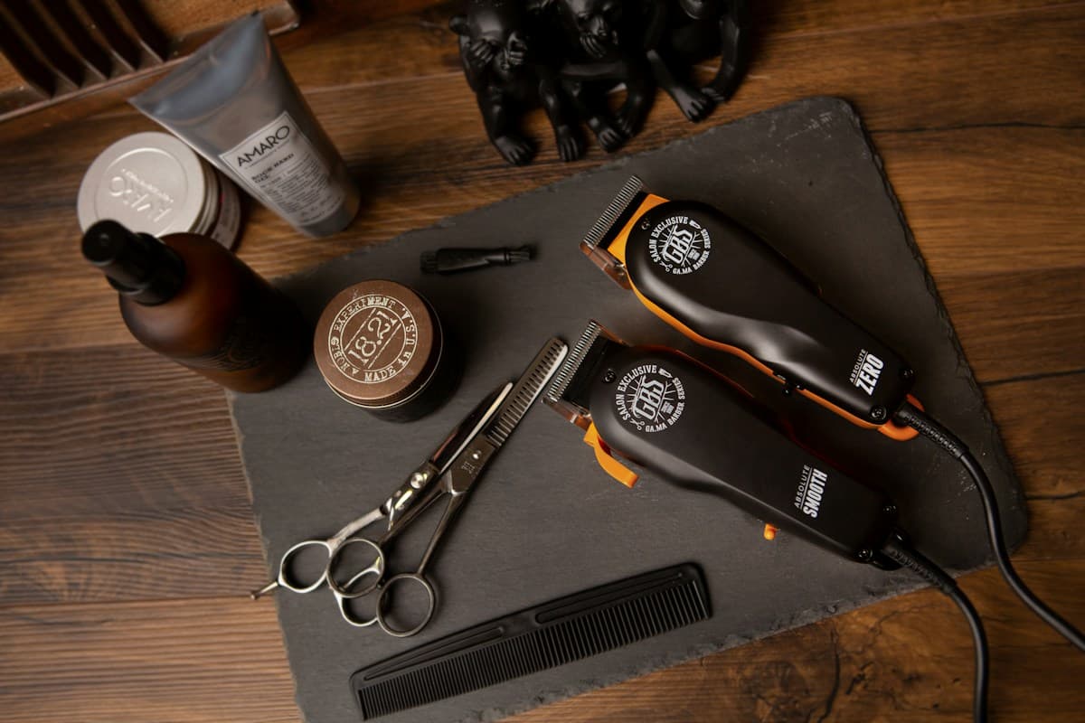 Barber preparing a client's haircut